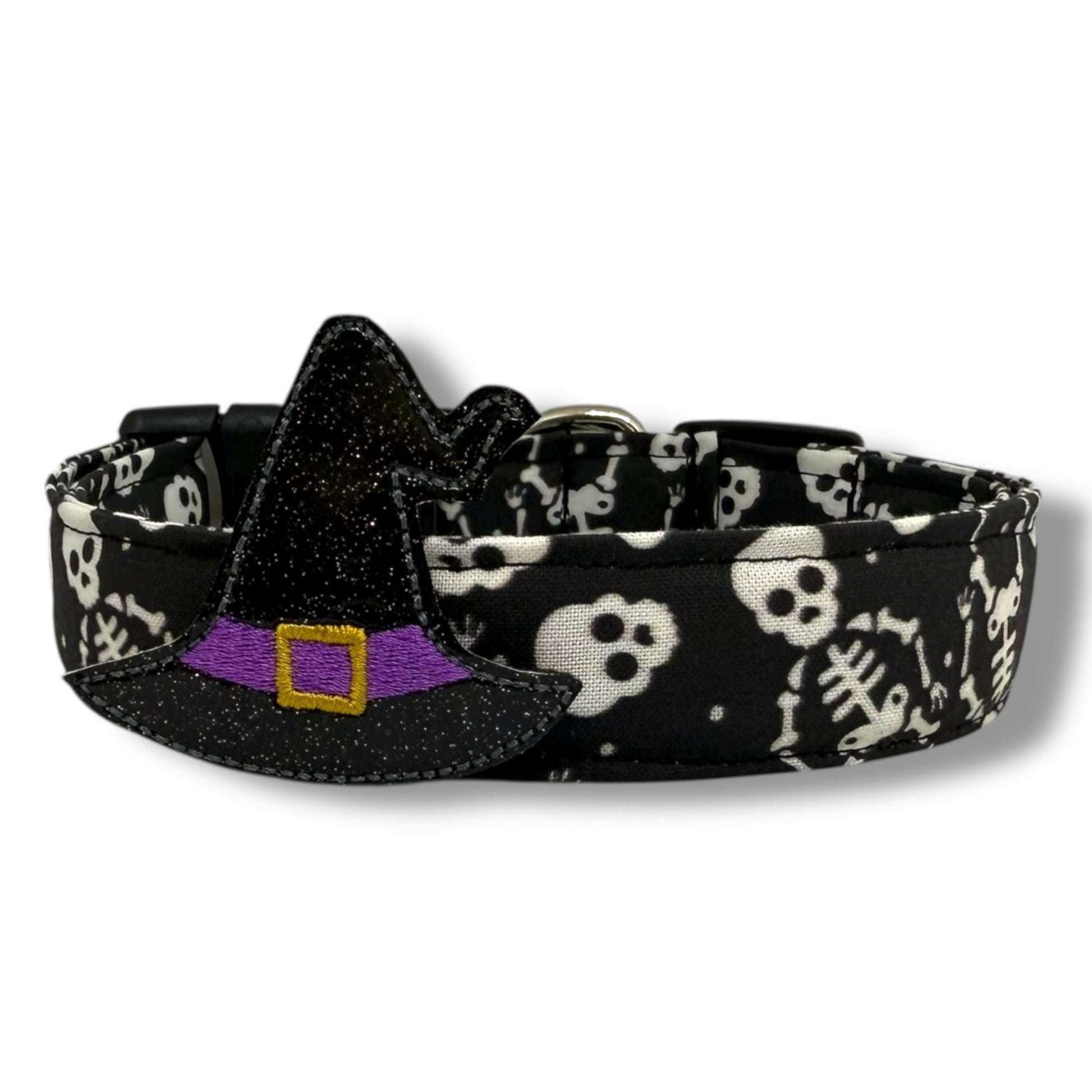 Halloween dog collar with skeletons and skulls on a black background, includes removable shimmery witch hat embellishment.
