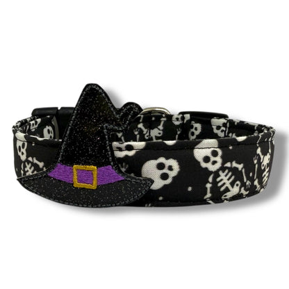 Halloween dog collar with skeletons and skulls on a black background, includes removable shimmery witch hat embellishment.