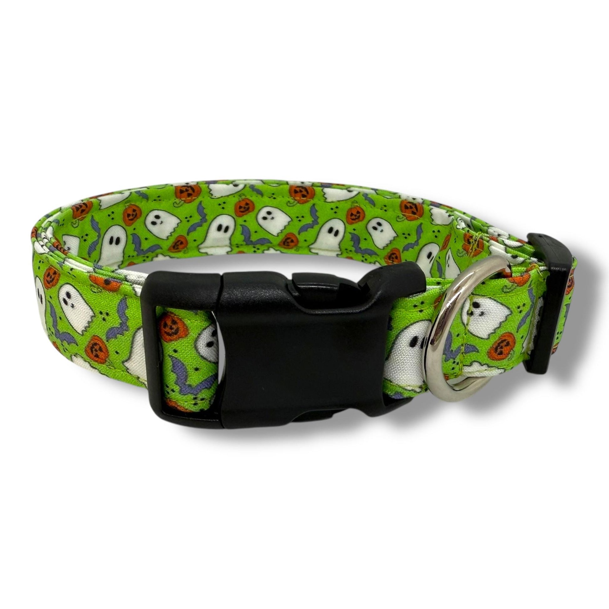 Halloween dog collar with ghosts, pumpkins, and bats on a bright green background.