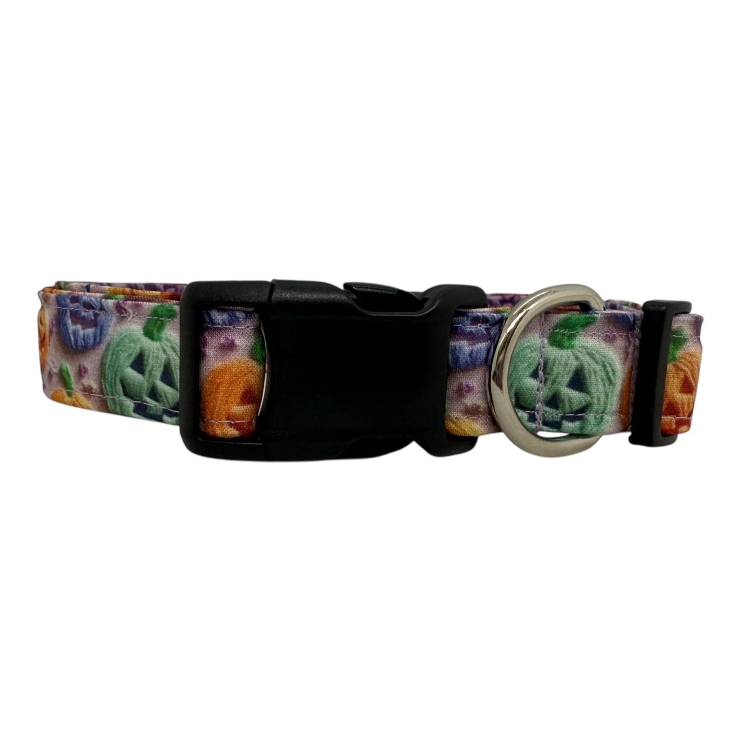 Halloween dog collar with rainbow jack-o’-lanterns in orange, green, purple, and blue.