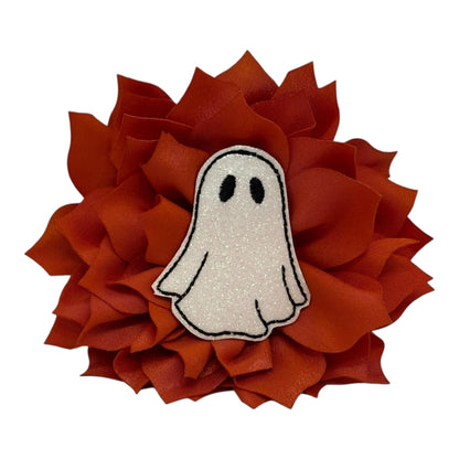 Orange dog collar flower with glittery ghost embellishment, available in 3" or 4" sizes, attaches with elastic loop for Halloween style.