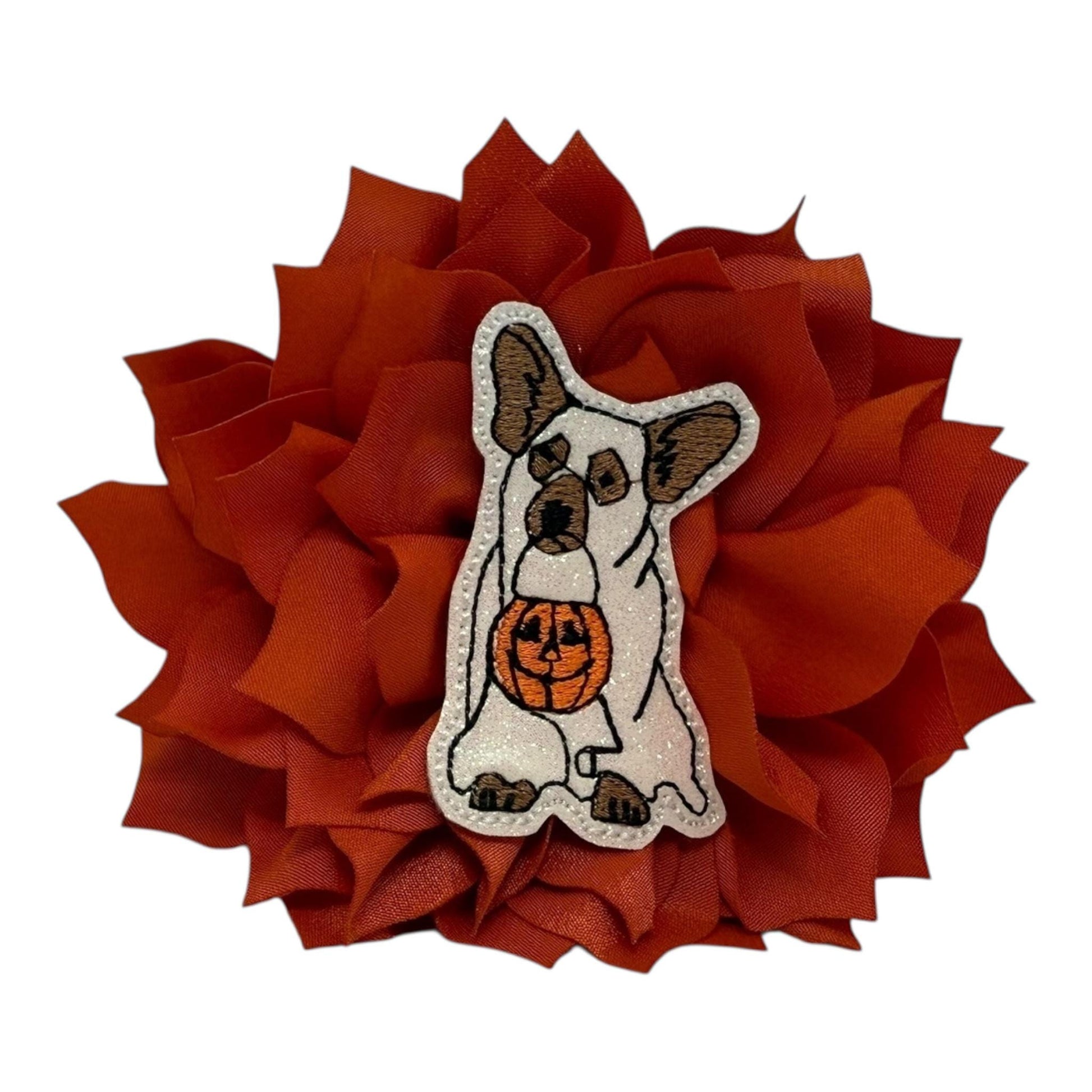 Orange dog collar flower with glittery ghost dog holding a pumpkin bucket, available in 3" or 4" sizes, elastic loop attachment.
