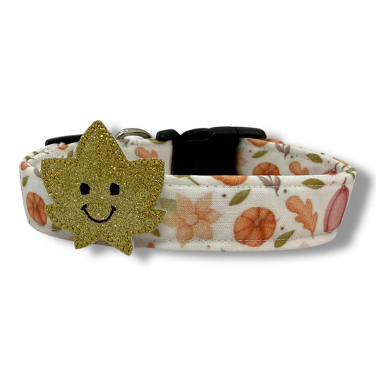 Halloween dog collar with ghosts, pumpkins, and bats on a bright green background, includes removable shimmery ghost embellishment.