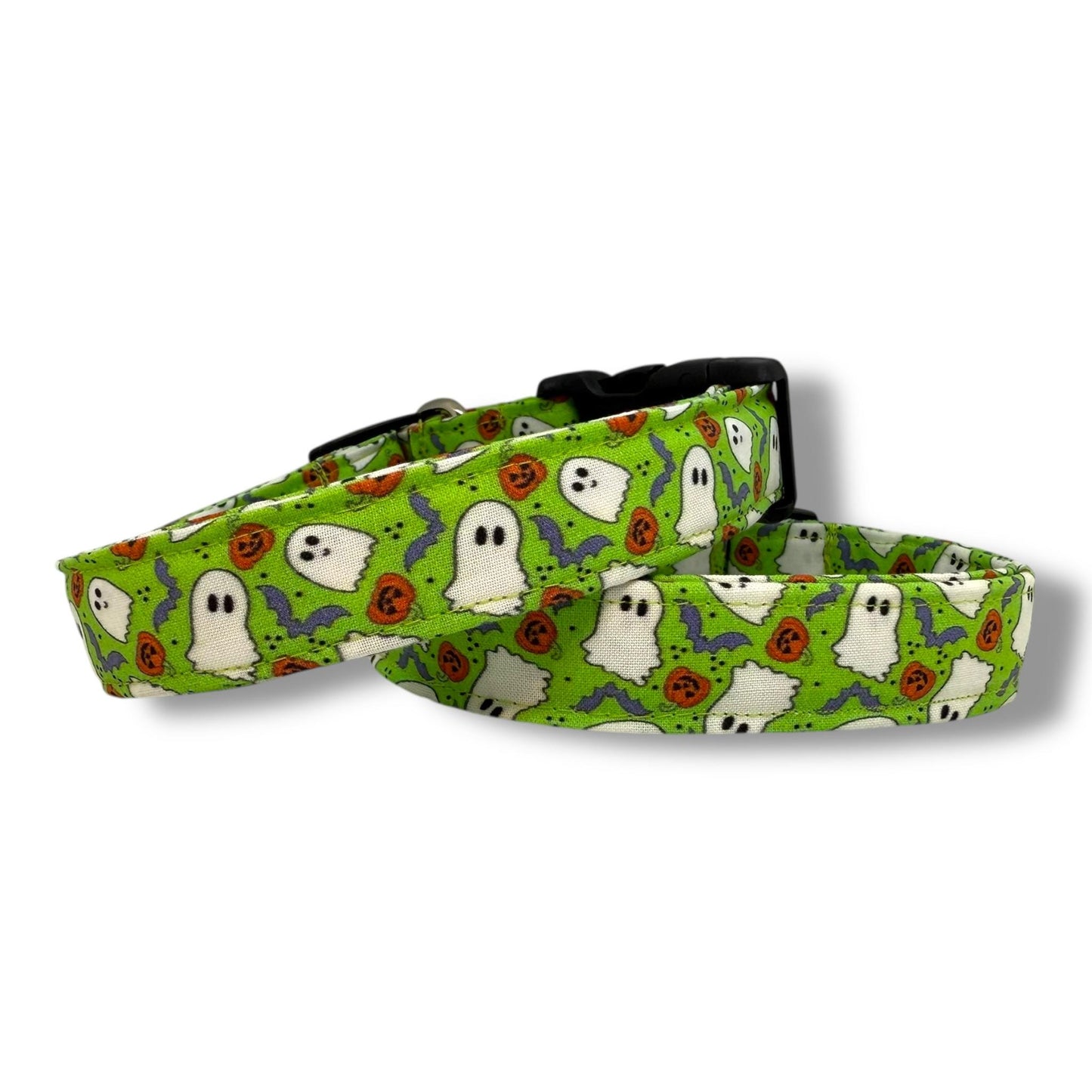 Bright green Halloween dog collar with ghosts, pumpkins and bats.