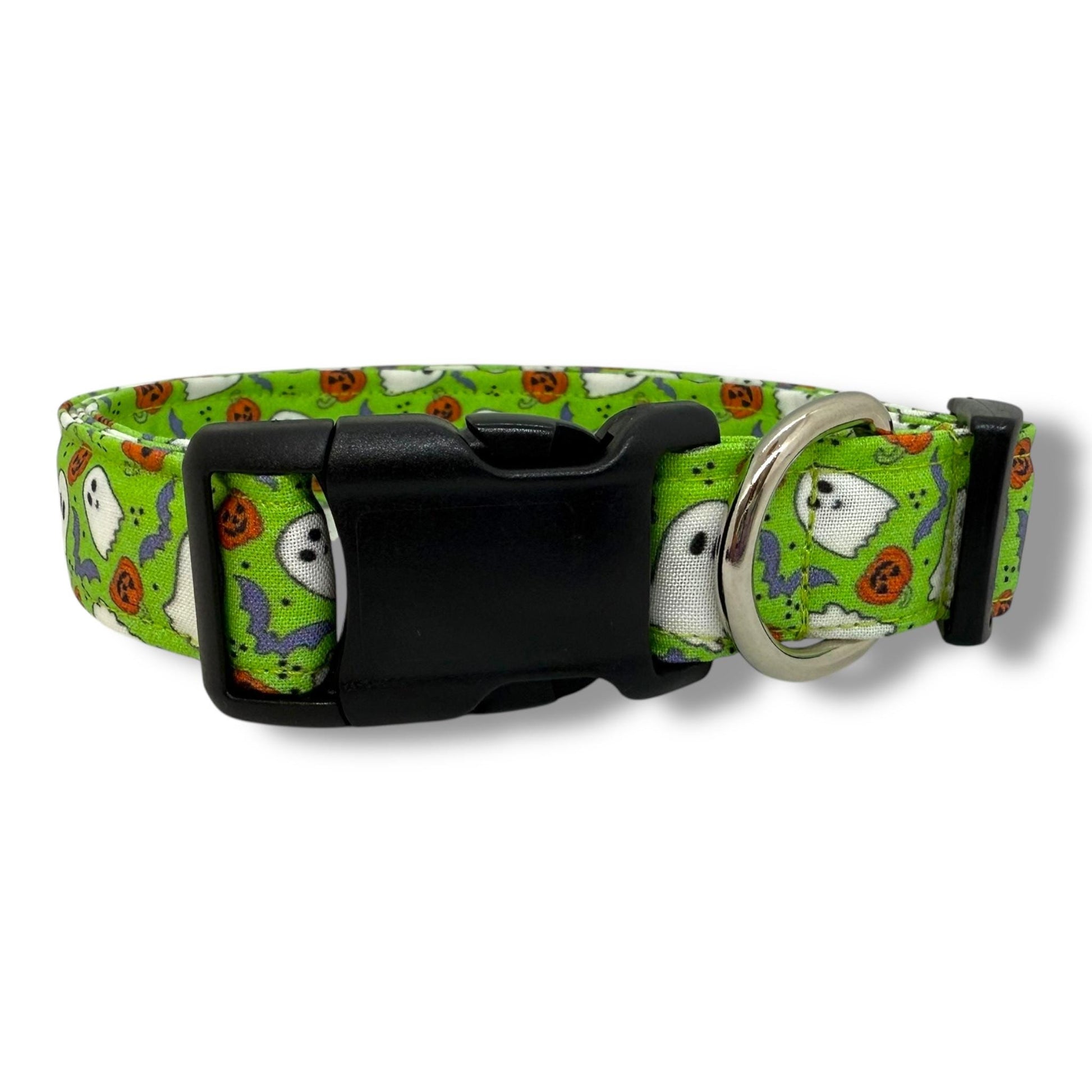 Halloween dog collar with ghosts, pumpkins, and bats on a bright green background.