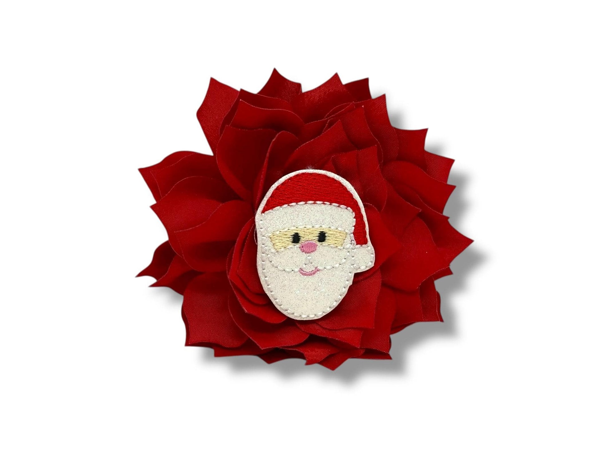 Red fabric dog collar flower with an embroidered Santa face in the center, featuring an elastic loop for easy attachment to any dog collar.
