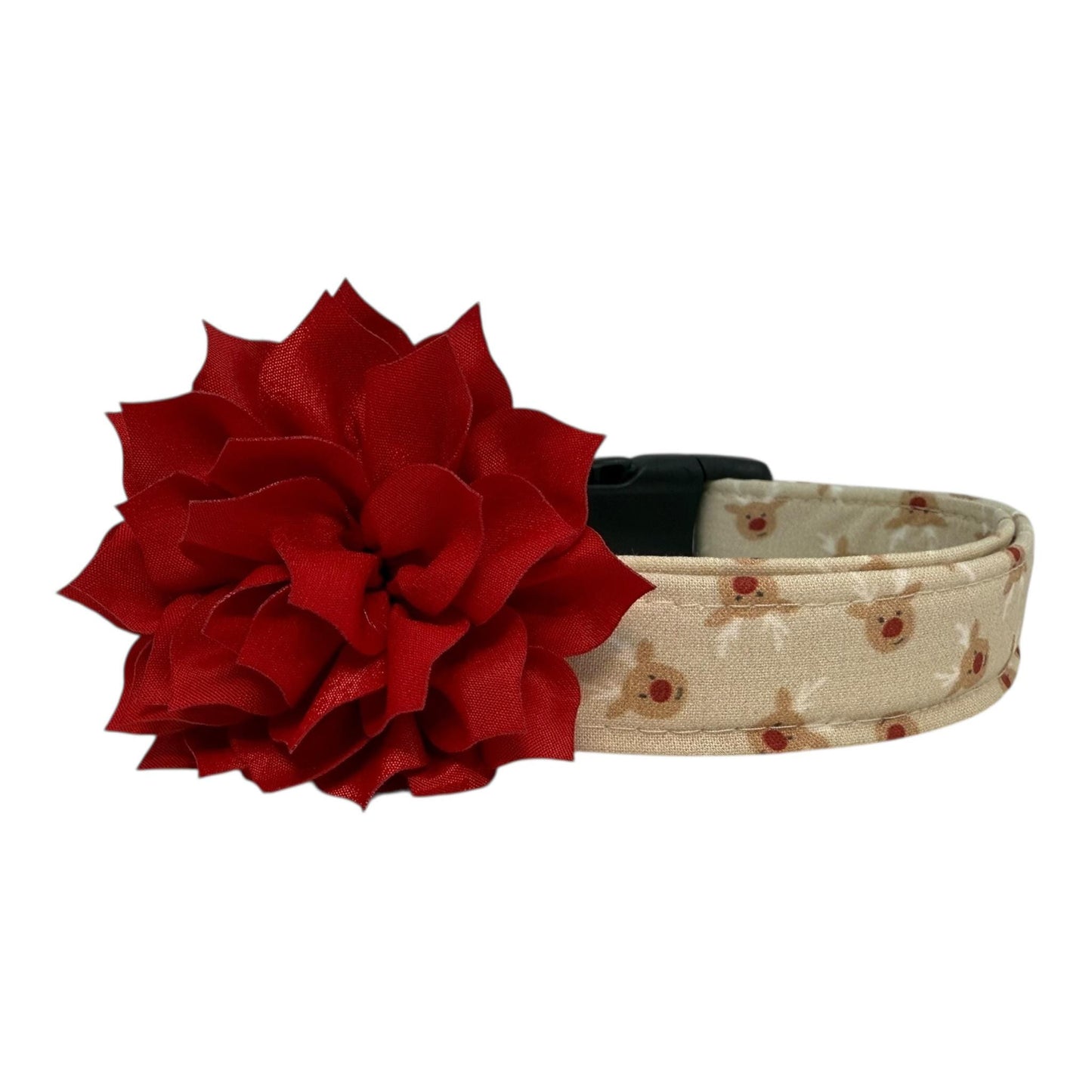 Beige dog collar with small red-nose reindeer faces and a removable flower attachment, adjustable with black buckle and metal D-ring.