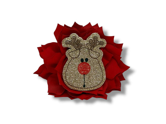 Red fabric dog collar flower with a shimmery red-nose reindeer embellishment, designed to attach to any dog collar with a soft elastic loop