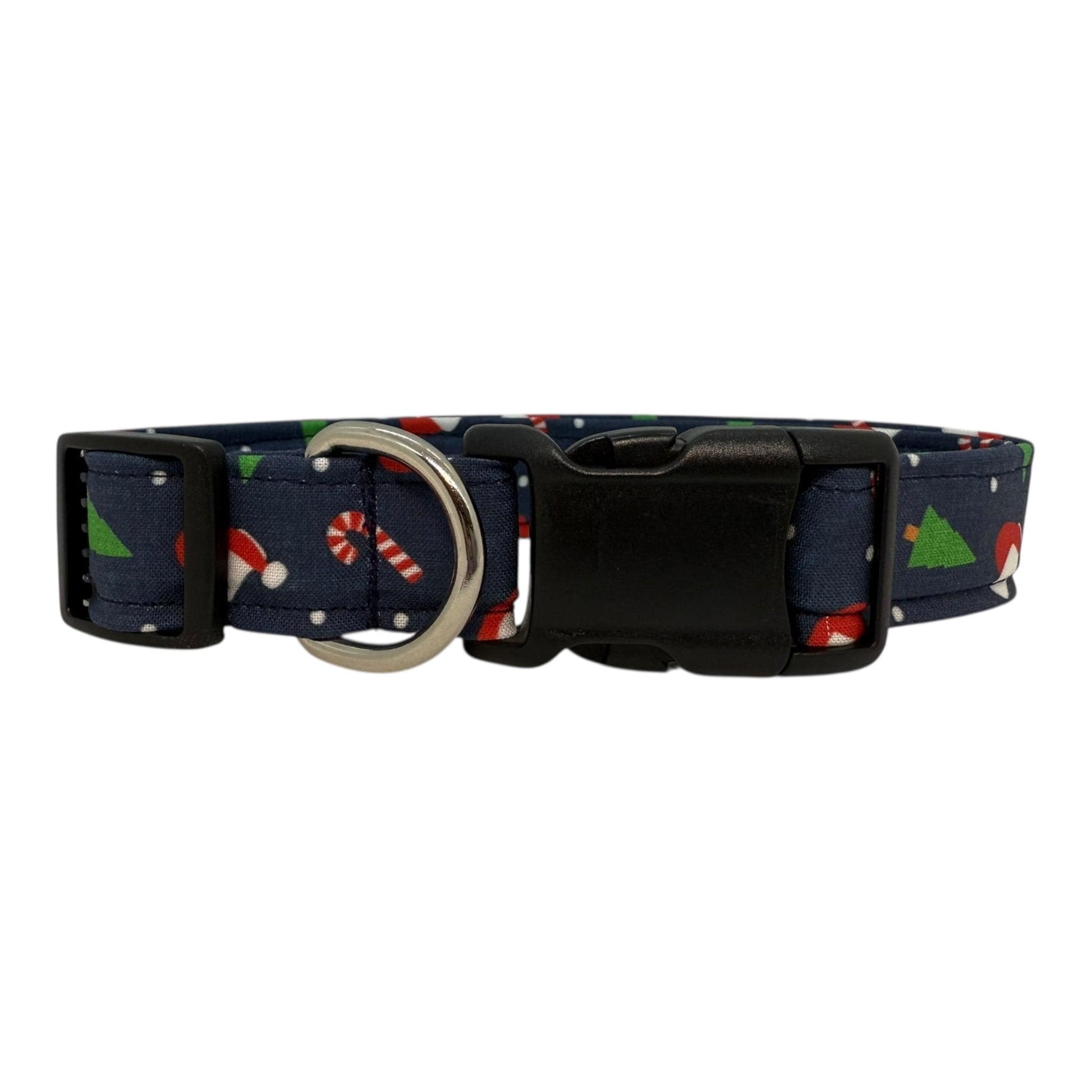 Navy cotton dog collar printed with small Christmas icons. The collar has a side-release buckle and metal D-ring, handmade and adjustable in multiple sizes.