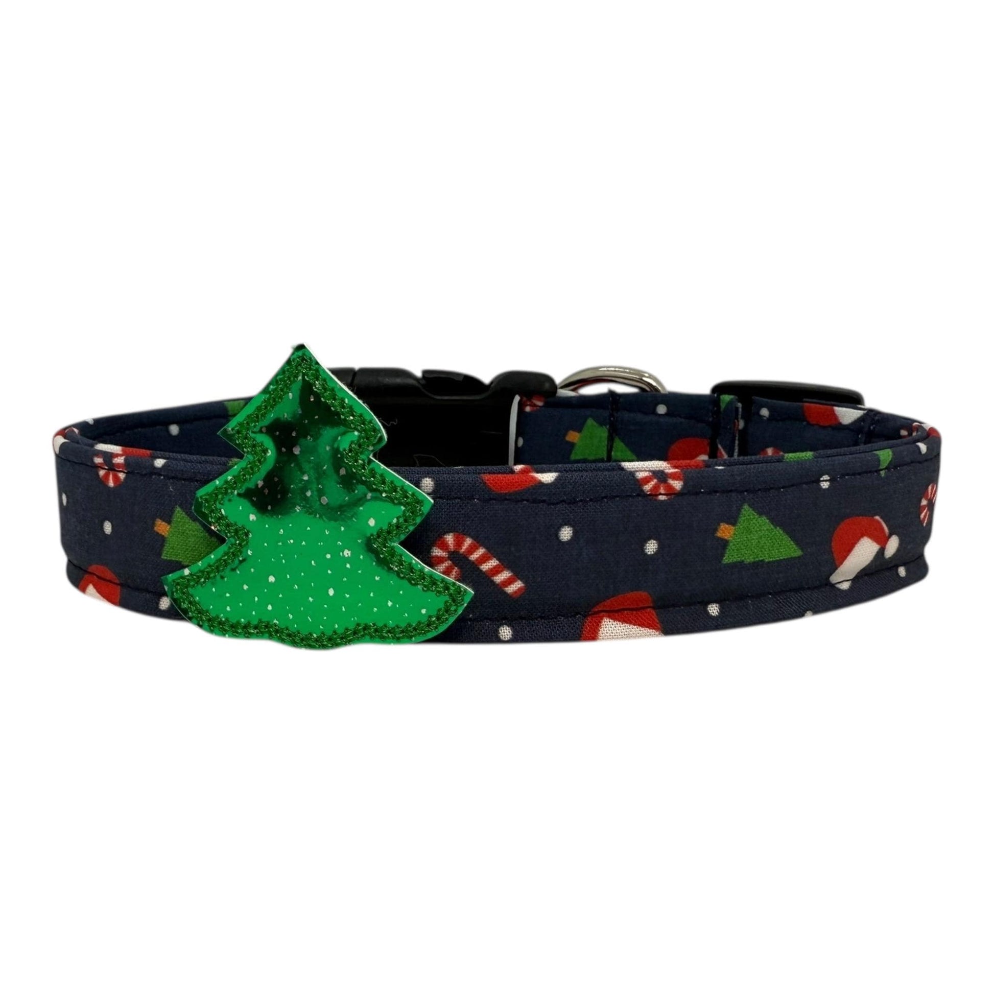 Navy cotton dog collar printed with small Christmas icons, featuring a removable Christmas tree embellishment. The collar has a side-release buckle and metal D-ring, handmade and adjustable in multiple sizes.