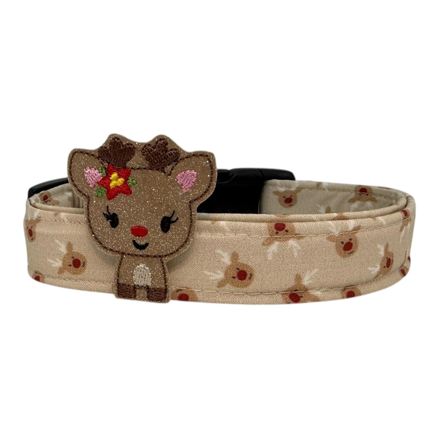 Beige dog collar with small red-nose reindeer faces and a removable reindeer embellishment, adjustable with black buckle and metal D-ring
